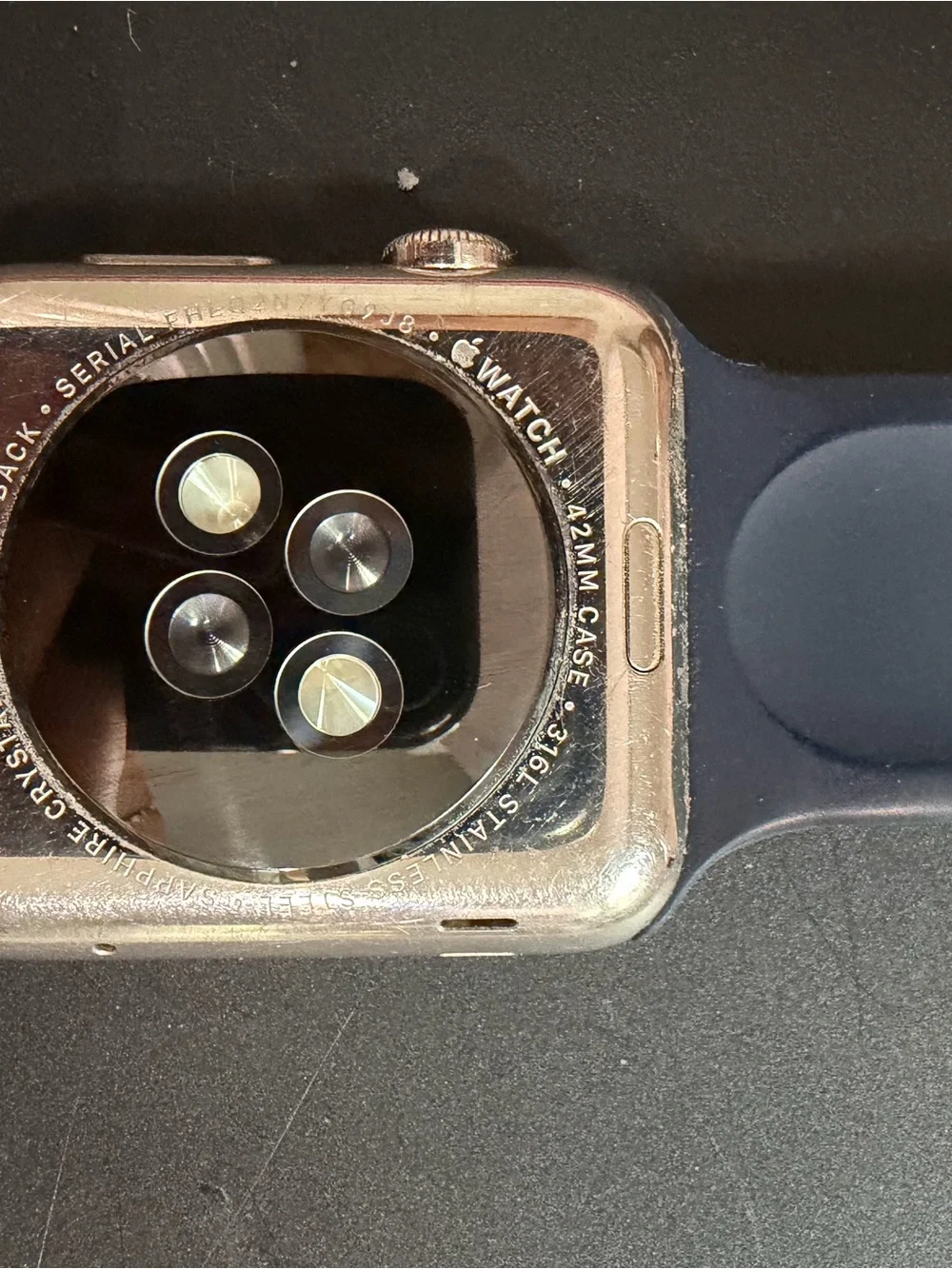 Apple Watch with Navy Blue Sport Band and White Charger